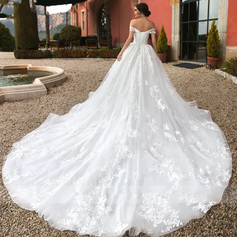 On Zhu Ball Gown Princess Wedding Dresses Beaded Sweetheart Cap Sleeve Lace Appliques Lace Up Bride Robe De Mariage Royale