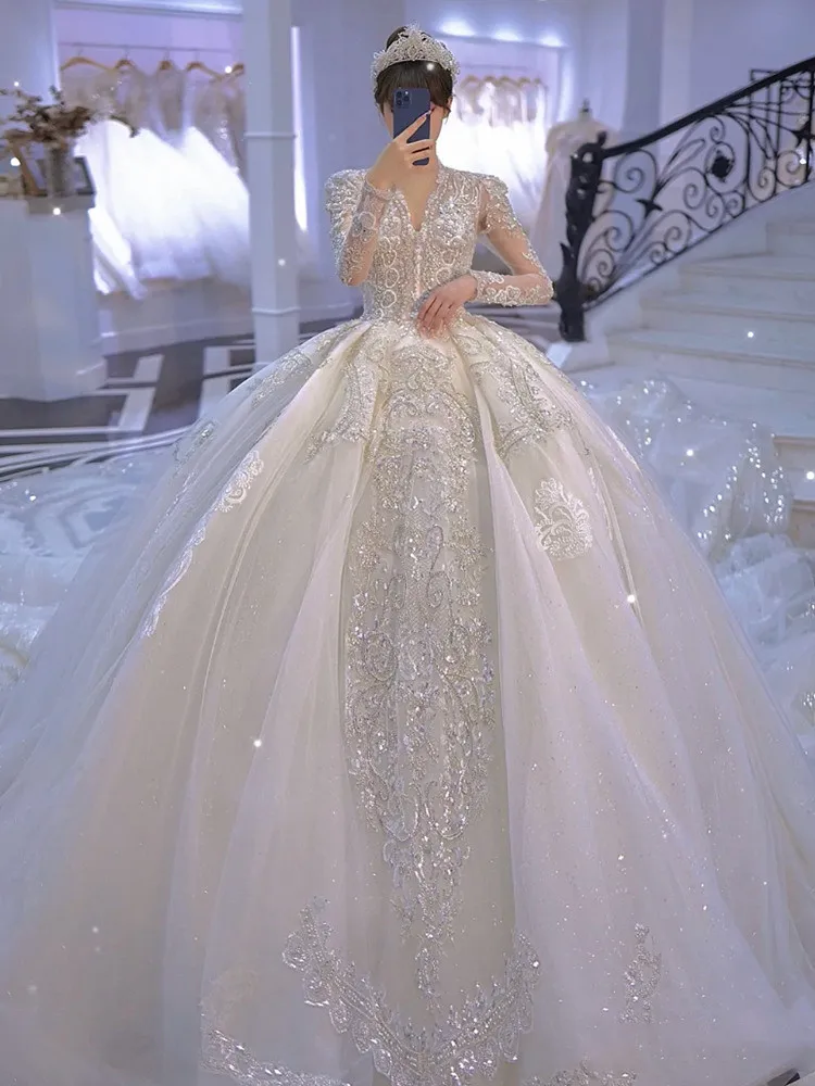 

Luxury White Wedding Dresses Long Sleeves V-Neck Lace Beaded Pearls Backless Sweep Train Appliques Lace Wedding Bridal Gown 2024