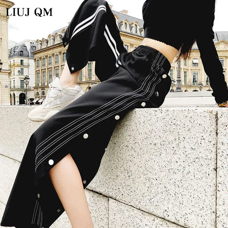 Autumn Woman Pants Side Stripe Stitching Plus Size 4XL Split Button Wide Leg Streetwear Women Loose Casual Hip-hop Track Pants Autumn Woman Pants Side Stripe Stitching Plus Size 4XL Split Button Wide Leg Streetwear Women Loose Casual Hip-hop Track Pants