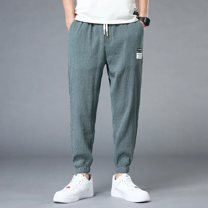 Men's cargo pants in silver technical fabric | Golden Goose