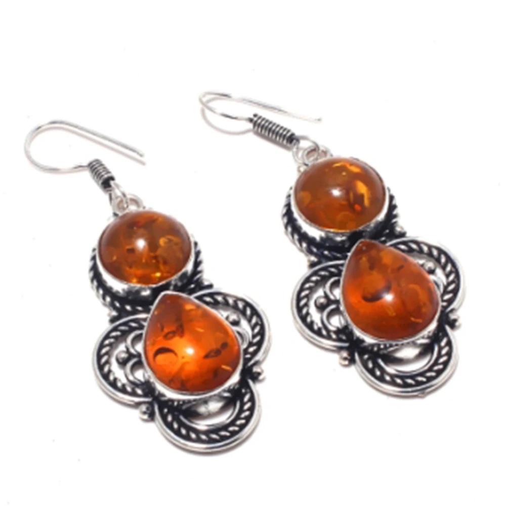 

Ambers Earrings Silver Overlay over Copper, 59 mm , E4141