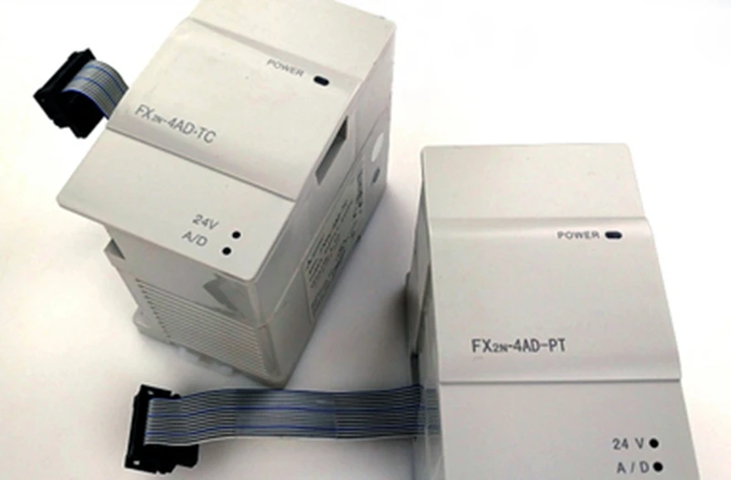 Товар в штучной упаковке FX2N-2AD FX2N-2DA FX2N-4AD FX2N-4DA FX2N-4AD-TC FX2N-4AD-PT FX0N-3A FX2N-1PG-E FX2N-10PG PLC на