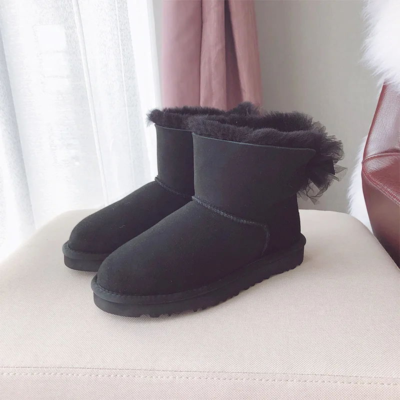 

High Quality Women Snow Boots with Bow,100% Natural Sheep Leather and Sheep Fur,Watperproof Shoes