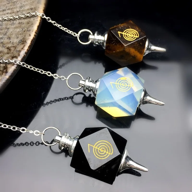 

Natural Reiki Chakra Symbol Carving Stone Pendulum for Biolocation Amulet Pendant Chain Quartz Crystal Pendulo Divination Tool