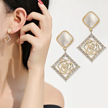 

High-end geometric shell hollow metal rose flower ladies vintage earrings exquisite elegant High Quality Fashion Stud Earrings
