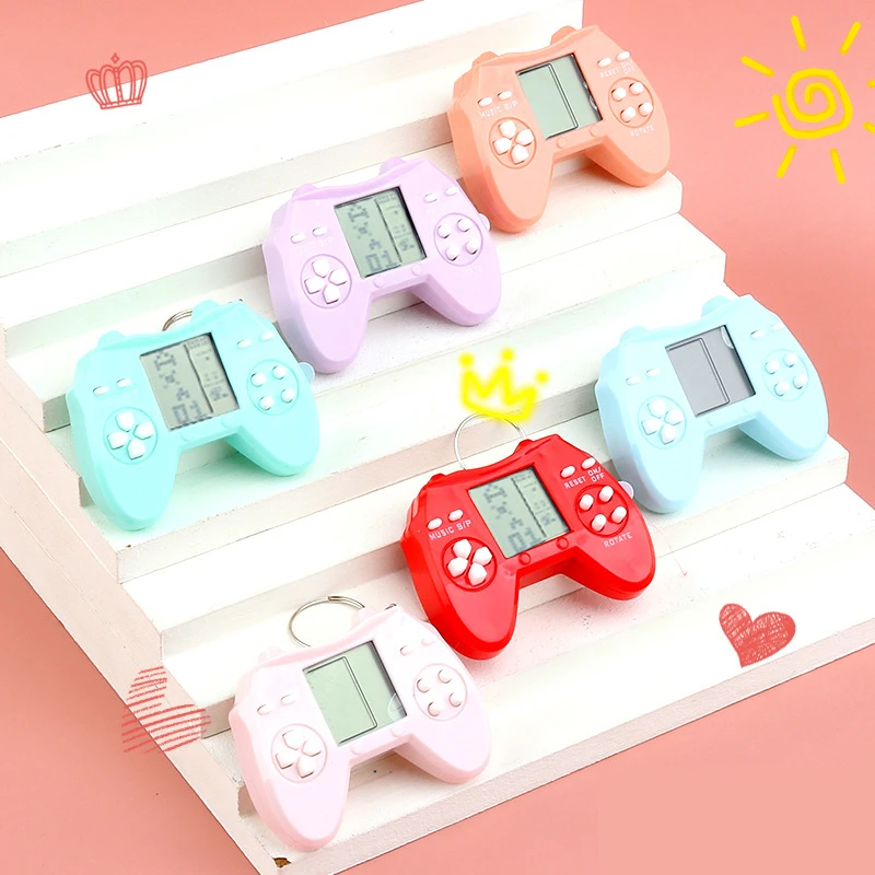 Retro Console Game Keychain Built-In 7 Games Puzzle Video Game Mini Handheld Game Console Pendant New Year Xmas Gift For Kids