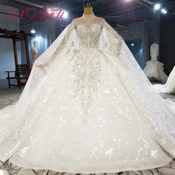 شراءAXJFU الفاخرة الأميرة الخرز زهرة الكريستال الدانتيل الأبيض اليدوية عالية الرقبة العروس الكشكشة الشمبانيا سباركلي فستان الزفاف 1699