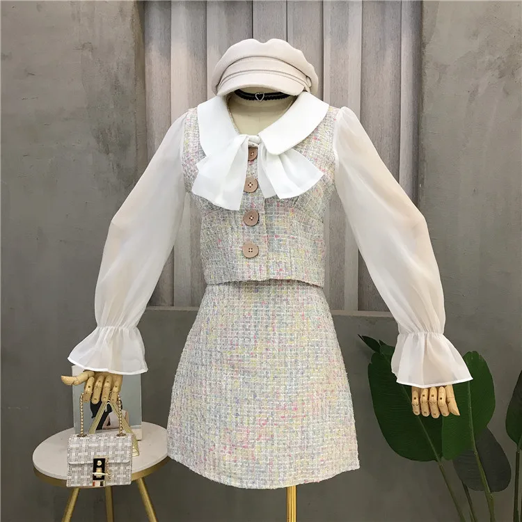 

2019 fashion new tweed suit female mesh stitching sleeves ocean bow shirt + high waist skirt two-piece suit