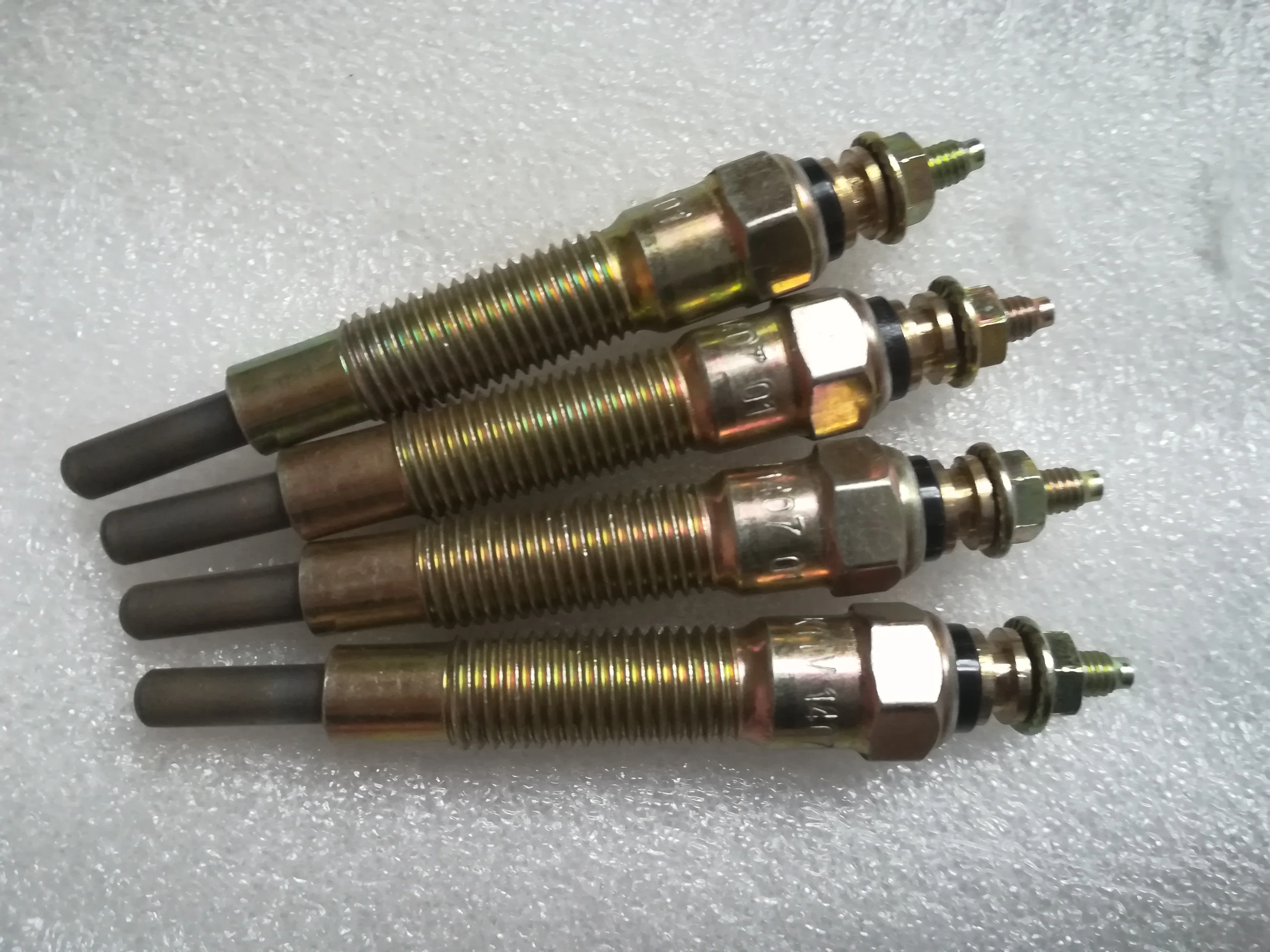 FreeShippingOEMQualityDieselGlowPlugFitForNissanNavaraQD32