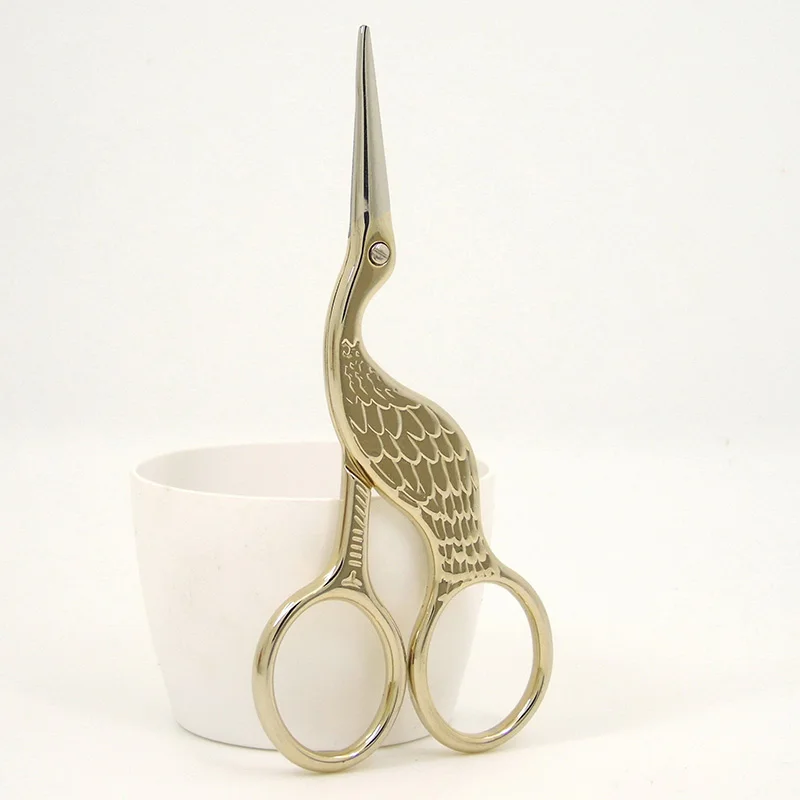 Gold bird scissor