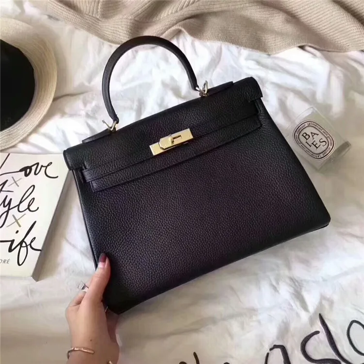 

Classic kay Head Layer Cowhide Litchi Grain 32 Inch Large Size Genuine Leather Woman Bag