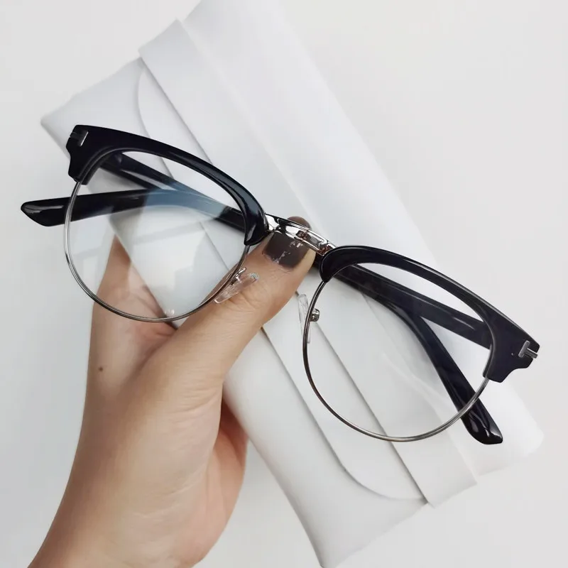 Montura de gafas de medio Metal para hombre y mujer, lentes ópticas de  estilo Vintage, 2023 - AliExpress