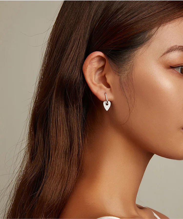 Heart Rectangle Hoop Earrings | S925 Sterling Silver | Go Glam Girl 6 Heart Rectangle Hoop Earrings | S925 Sterling Silver | Go Glam Girl - Show your style with the delicate Heart Rectangle Hoop Earrings. Hand-finished in sterling silver, every hoop earring has a heart dangling on it and encrusted with small sparkling zircons. These dreamy earrings, full of a romantic atmosphere will bring mood and beauty to your day. Perfect gift for mom, sister, grandmother, friend or yourself. | 🚚 Free Standard Shipping 7-30 days | 🥇 Top Quality Product | 💎 100% S925 Sterling Silver | 🛡️ 100% Safe & Secure checkout