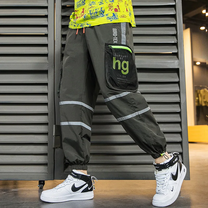 

Fashion Men's Loose Cargo Pants Black Reflective Fluorescent Hip Hop Harem Pants Large Size Pocket Cargo Hip Hop Dance Pants
