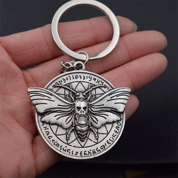 

12pcs Round Dead Head Skull Butterfly Hawkmoth Keychain Christmas gift
