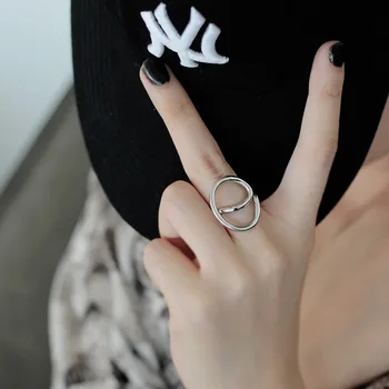 

Korean version of simple niche S925 sterling silver E letter ring female opening hollow geometric lines index finger ring