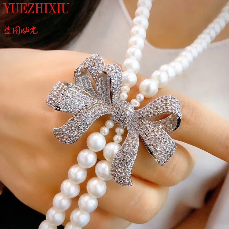 

Freshwater pearl sweater chain 8-9mm round long sweater Bowknot inlay zircon chain delicate necklace 32inch