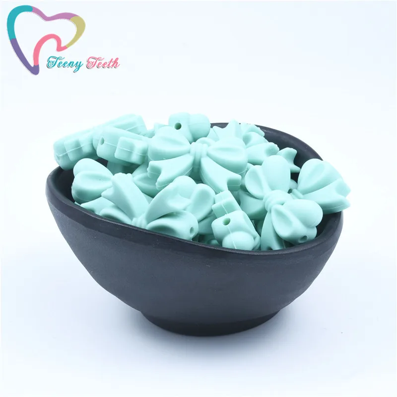 Turquoise 20 шт. галстук-бабочка Силиконовые Бусины 3 см ошейник с бантиком свободные бусины DIY пустышка цепи Детские Жевательные бусы без содержания бисфенола А погремушка детский Прорезыватель - Цвет: Turquoise