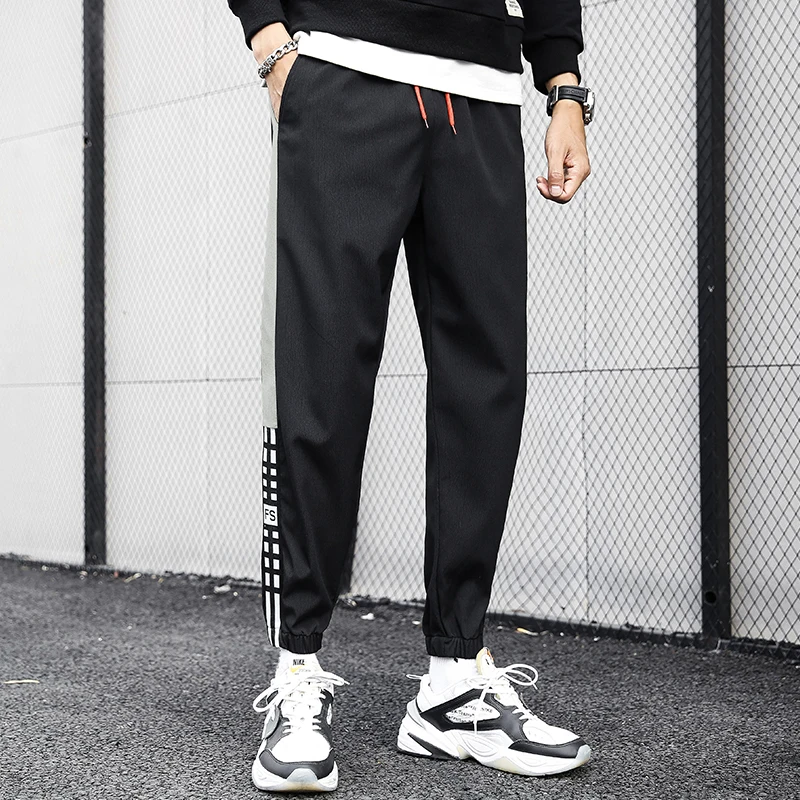 

Men's Sports Beaded Pants Korean Trend Casual Pants 2020 New Wild Spring and Autumn Straight Pants Men's Tide Elasticated pants