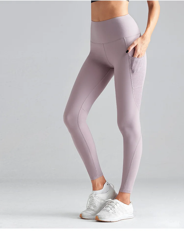 Cross Border Hot Selling New Style Pocket Yoga Pants Women's Hollow out Joint Buttock Lifting Fitness Pants Running Sports