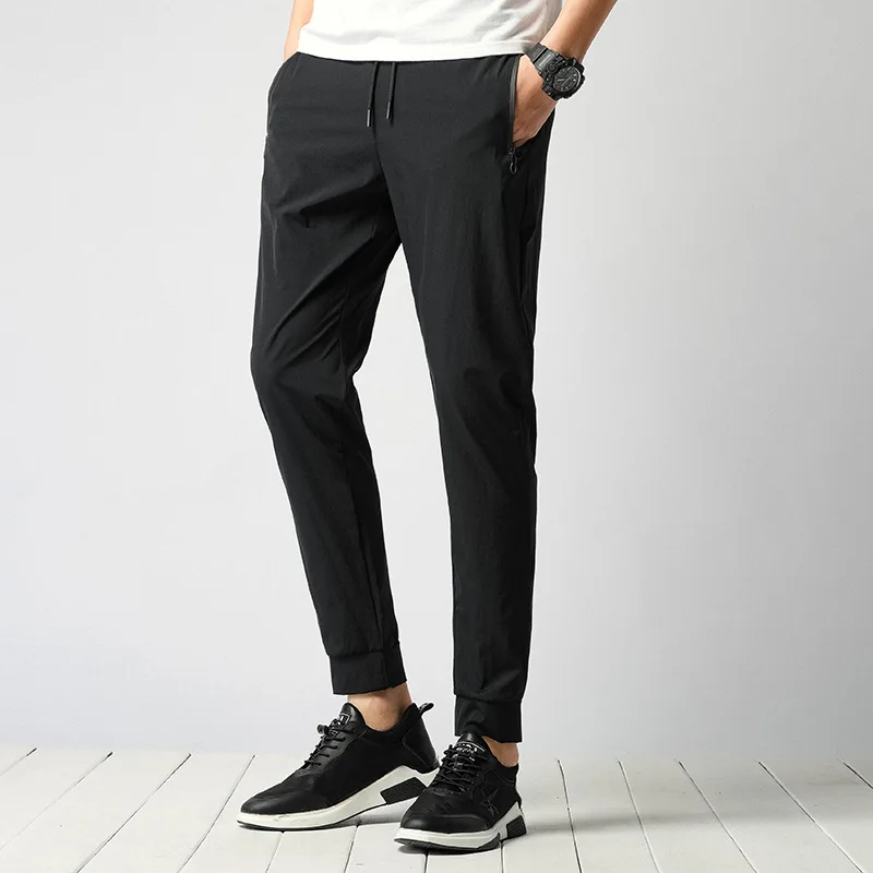 Spring And Summer Thin Outdoor Casual Versatile Sports Mountain Climbing Trousers Men's Closing Beam Leg Elasticity Plus-sized Q