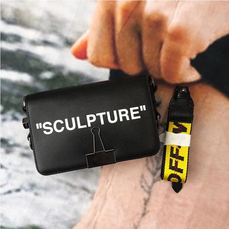

Famous designer black white striped handbag mini bag leather diagonal clip bag luxury handbag trend yellow strap shoulder bag