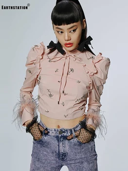 

Free shipping Heavy craft Beading Frills Puff sleeves stitching feathers Lace-up pullover shirt Ladies autumn new fashion tops