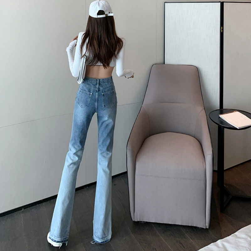 

Autumn retro Hong Kong style jeans women 2020 new Korean style slit flared pants Loose raw edge gradient jean