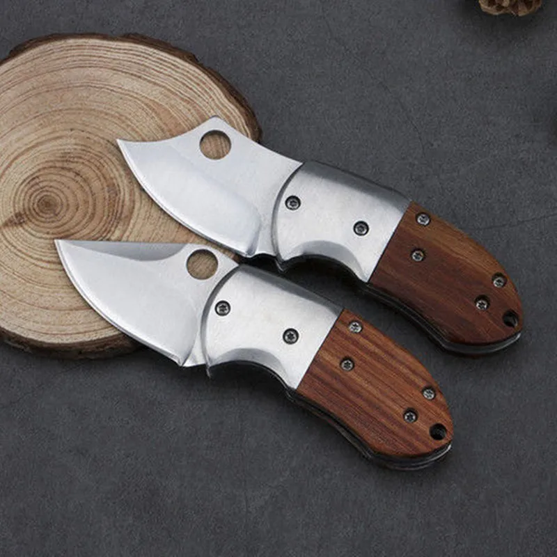 

Free Shippin Wood Handle Mini Pocket Folding Knife CS Knives Hunting Military Knives Weapons Survival Outdoor Tool For Man Women