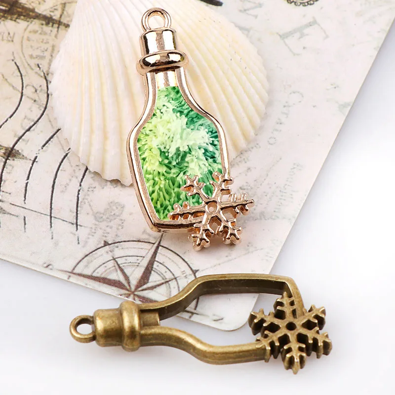 Vintage-Bottle-Snowflake-Antique-Metal-Hollow-Frame-Glue-Blank-Connector-Charms-Pendant-DIY-Jewelry-Findings-Accessories (1)