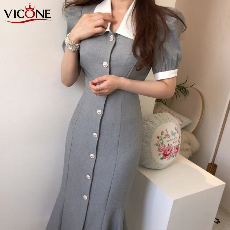 

VICONE Chic new custom pearl buttons show thin tail hubble-bubble sleeve splice cultivate one's morality dress