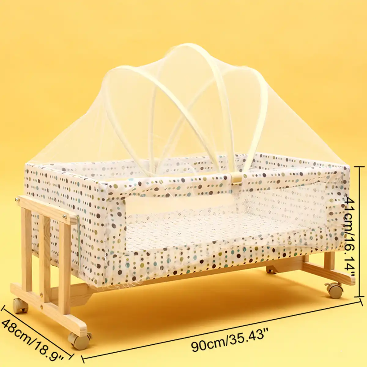 wooden bassinet on wheels
