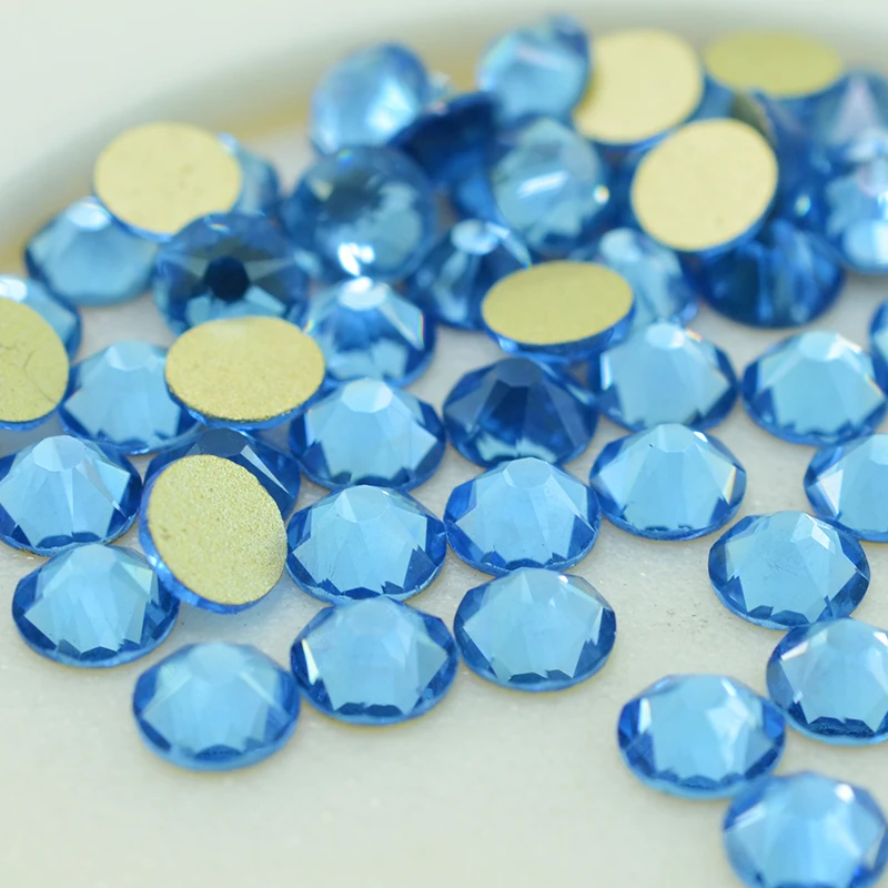 

New Faced (8 big + 8 small) ss20 (4.8-5.0mm) and ss16(3.8-4.0mm) Lt.Sapphire Color Glue On Non-hotfix Rhinestone