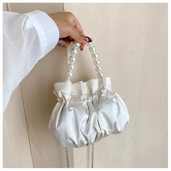 

Folds women shoulder crossbody bag Pearl bracelet designer handbags high quality Leather Pearl bracelet small leather handbags