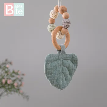 

1Pc Baby Wooden Teether Leaves BPA Free Wood Ring Rattle Plush Animal Teeth Pendant Baby Play Gym Toy Children's Good Nurse Gift