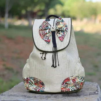 

Hot Vintage string appliques women traveller backpacks!Nice Floral embossing Lady hasp backrack New Versatile cover backruck