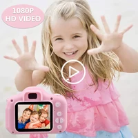 Çift Lens çocuk Mini dijital kamera + 32GB TF kart 1080P Video kayıt 2 inç dokunmatik ekran Mini dokunmatik ekran 6 dil