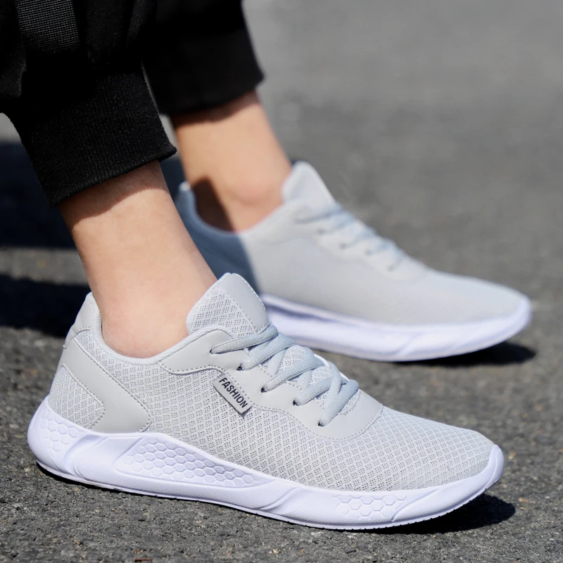 

2020 Men's Casual Shoes Large Size Mesh Running Shoes Outdoor Sports Solid Color 48 Size Fashion Light Breathable White Sneakers