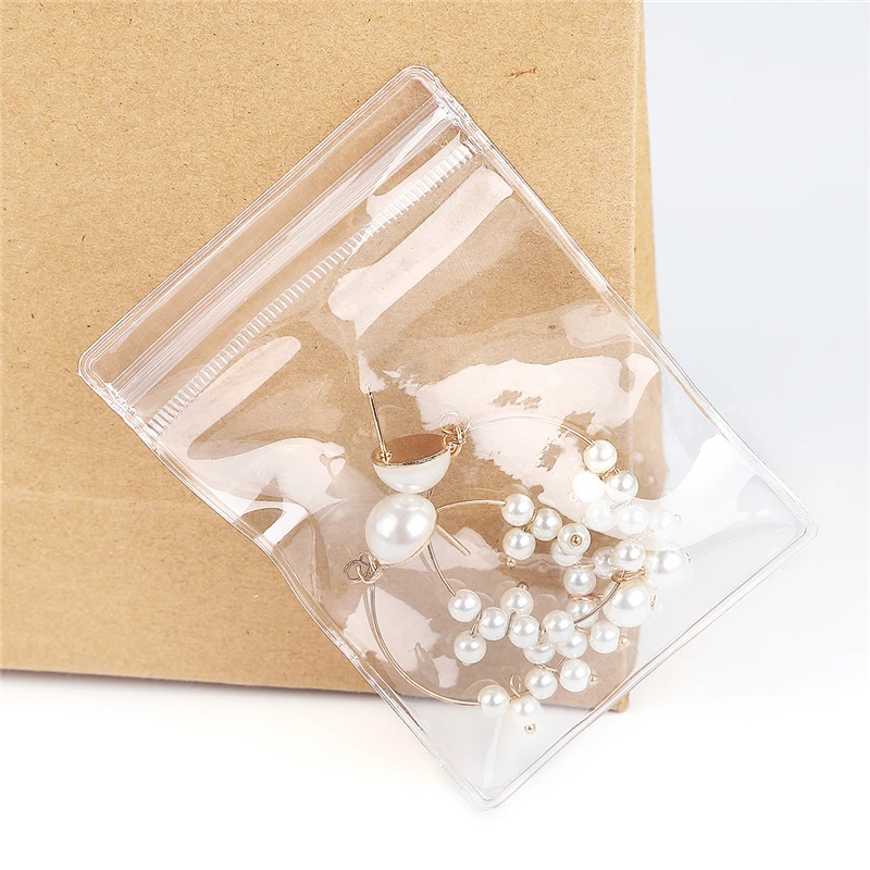 NATX 100pcs Clear PVC Transparent Zip Lock Jewelry Bag Small Size Dust Proof Airtight Pouch Plastic Zipper Self Seal Packing, Gold
