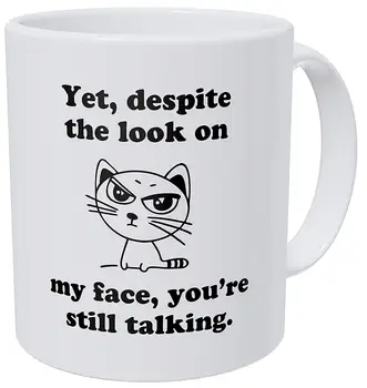 

Sarcastic Cat Yet Despite The Look on My Face You're Still Talking 11 Ounces Funny Coffee Mug