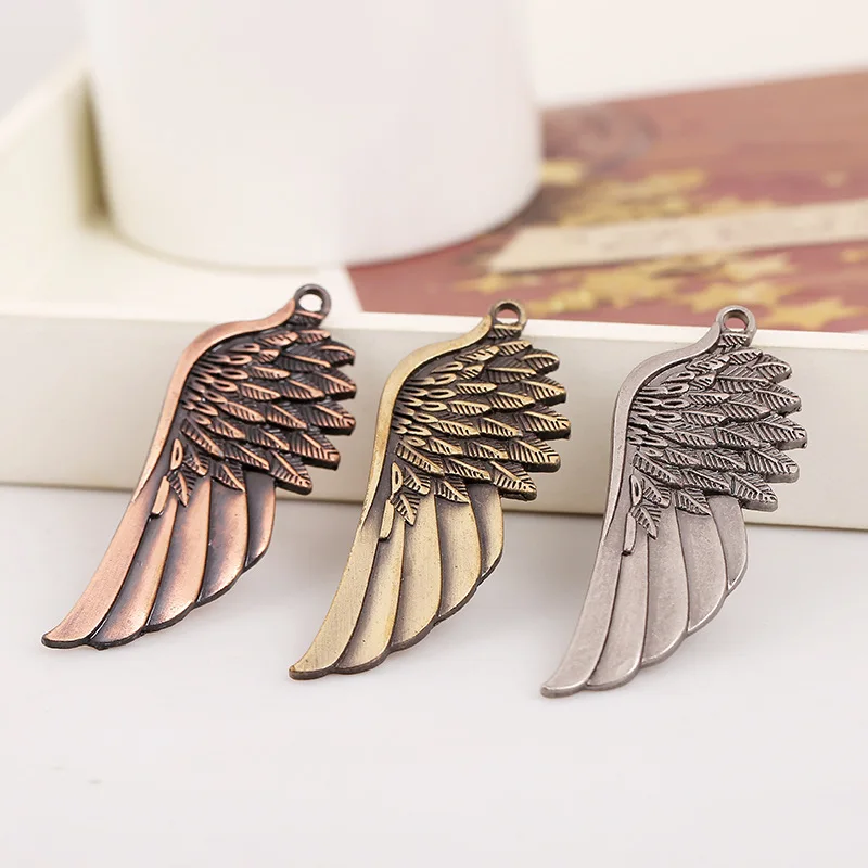 

1 piece 67MM*22MM DIY jewelry bracelet necklace key ring accessories jewelry pendant three-color retro alloy wings pendant