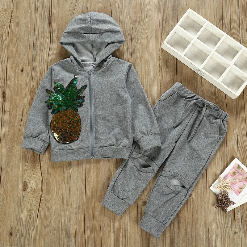 Tanie Dzieci dziewczyny ubrania stroje wiosna jesień cekiny ananas topy z kapturem + odkrywka spodnie 2 sztuk zestaw Boutique dzieci odzież garnitur