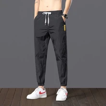 

2020 Summer Thin Mens Joggers Pants Breathable Casual Formal Sweatpants Pants Baggy Loose Man Sports Harem Pants Black Grey