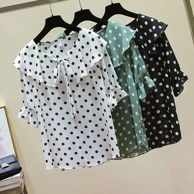green and black polka dot blouse
