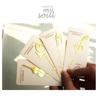 

4pcs Instrument style bookmarks Music note book mark Gold plated Stationery office School supplies marcador de livros A6145