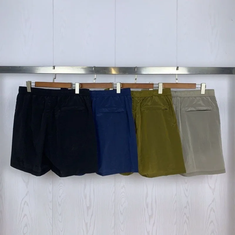 The best summer beach shorts men's sports casual quick-drying five-point pants men's casual badge embroidered shorts The best summer beach shorts men's sports casual quick-drying five-point pants men's casual badge embroidered shorts