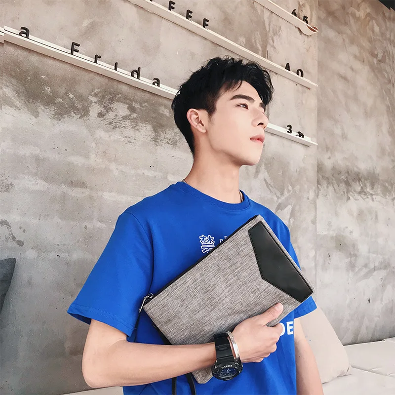 

Japanese and Korean version of canvas gray men's hand bag trend contrast color business document bag casual street wrist bag