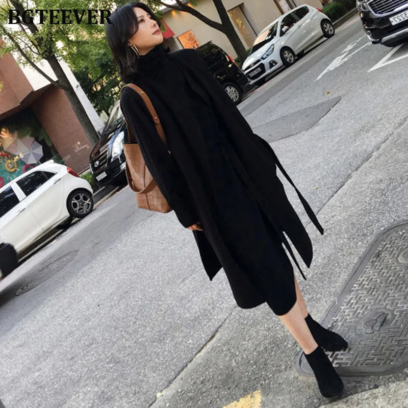 Baratos Vestido de Jersey para mujer, cuello alto, manga completa, fajas, Vestidos de punto para mujer, de longitud media, suelto, Vestido de punto para mujer, Otoño Invierno 2019