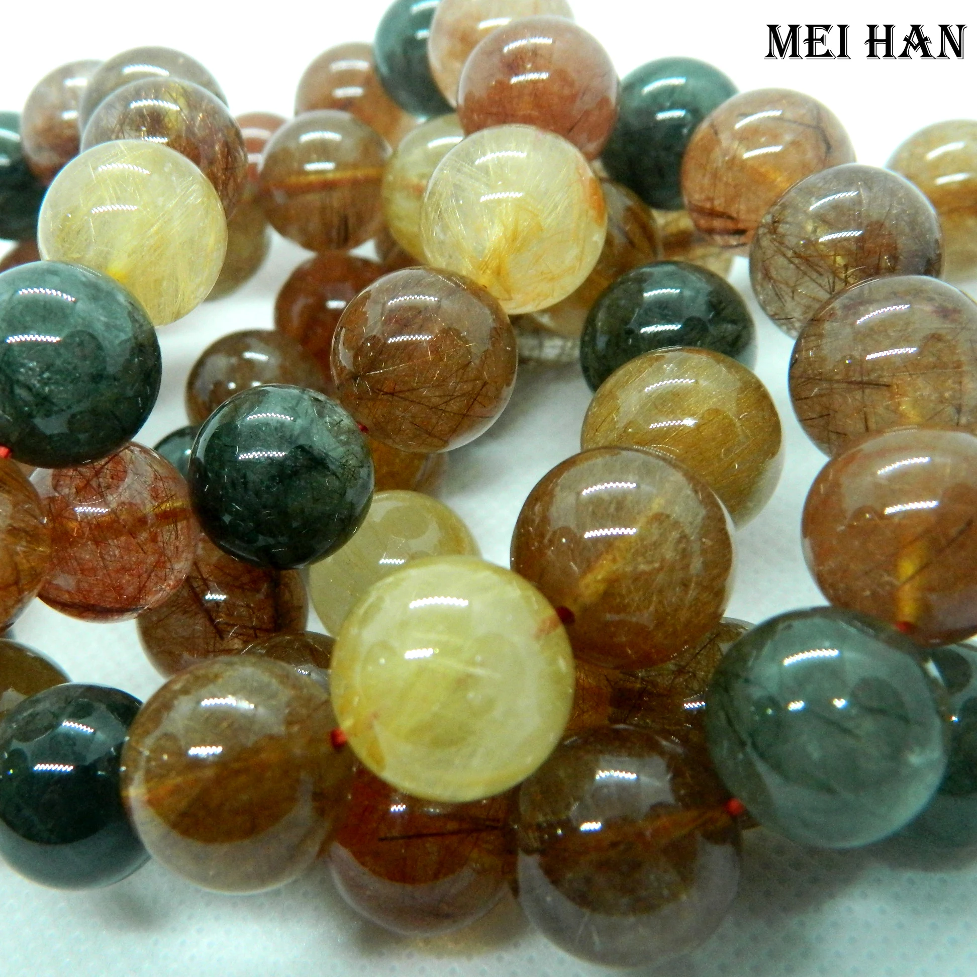 

Meihan free shipping (15beads/set/60g) natural Brazil 14-14.8mm A+++ rutilated quartz smooth round beads stone