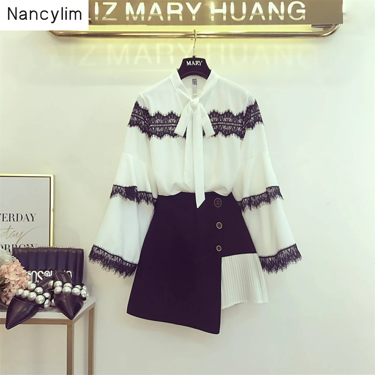 

2019 Fall Blusa Sets for Women New Butterfly Bow Collar Bell Sleeve Shirt + Irregular Stitching Pleated Skirt Two-piece Suit